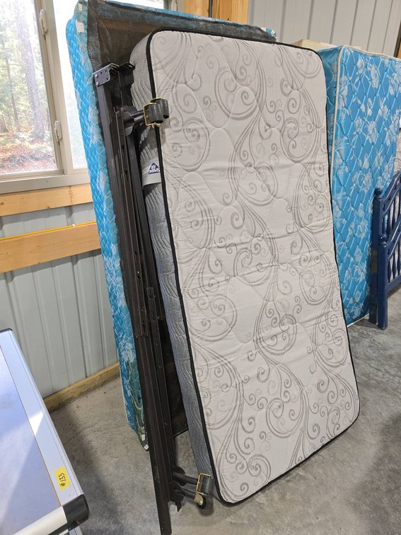 Spring Air Twin Mattress With Serta Box Spring and Metal Bed Frame on Wheels