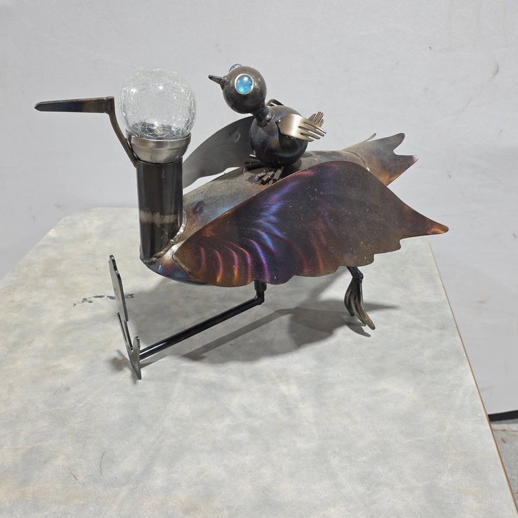 Wall Mountable Metal Aquatic Bird Sculpture With Baby Rider and Glass Accent Light