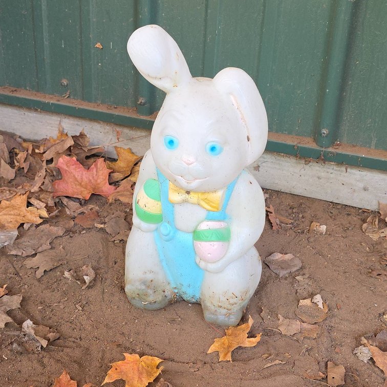 Empire 15" Tall Light-Up Plastic Easter Bunny Blow Mold Decoration With Egg and Bow Tie