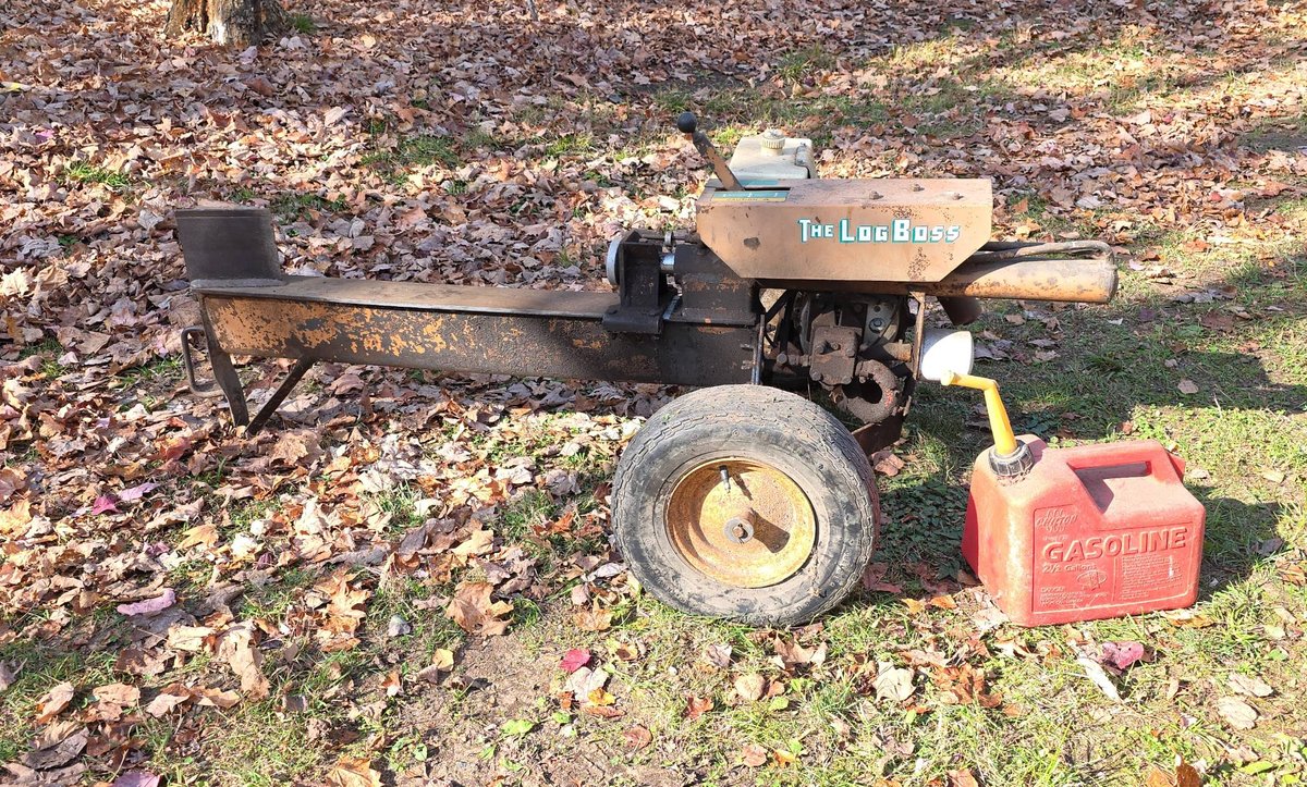 The Log Boss Log Splitter with Tecumseh Engine, 26" Throw, Good Compression, and Gas Can