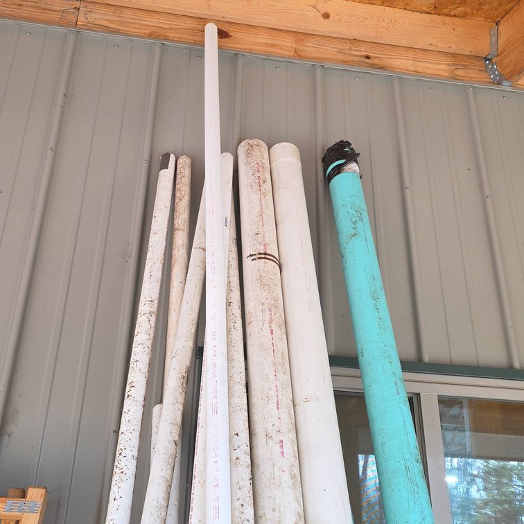PVC Pipe Lot: (6) 1 1/2" Pieces and (4) 4" Pieces, Most 10' Long, One 12', Plus Extra Small Pieces