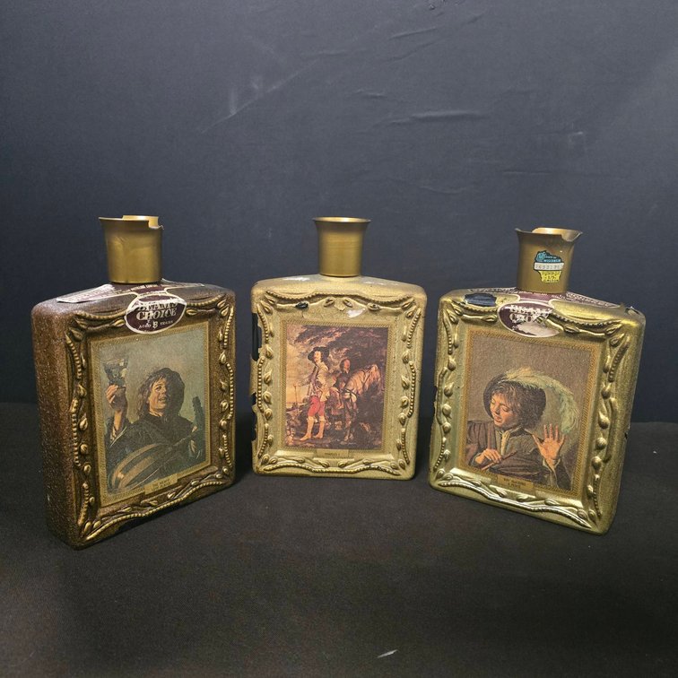 3 Decorative Bottles With Framed Art Motif and Metal Spouts