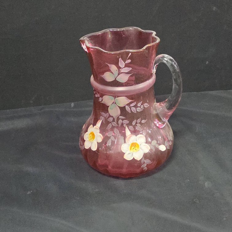 Hand-Painted Cranberry Glass Pitcher with Floral Design and Clear Handle