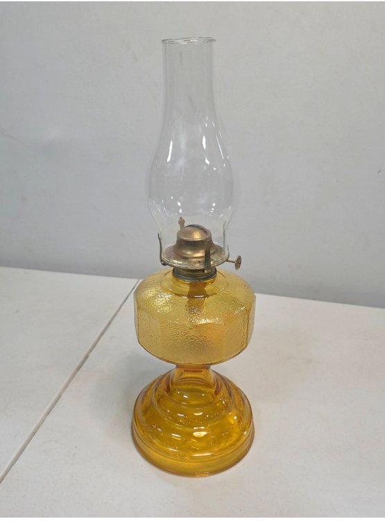 Amber Pressed Glass Oil Lamp with Decorative Base, Metal Burner, and Chimney