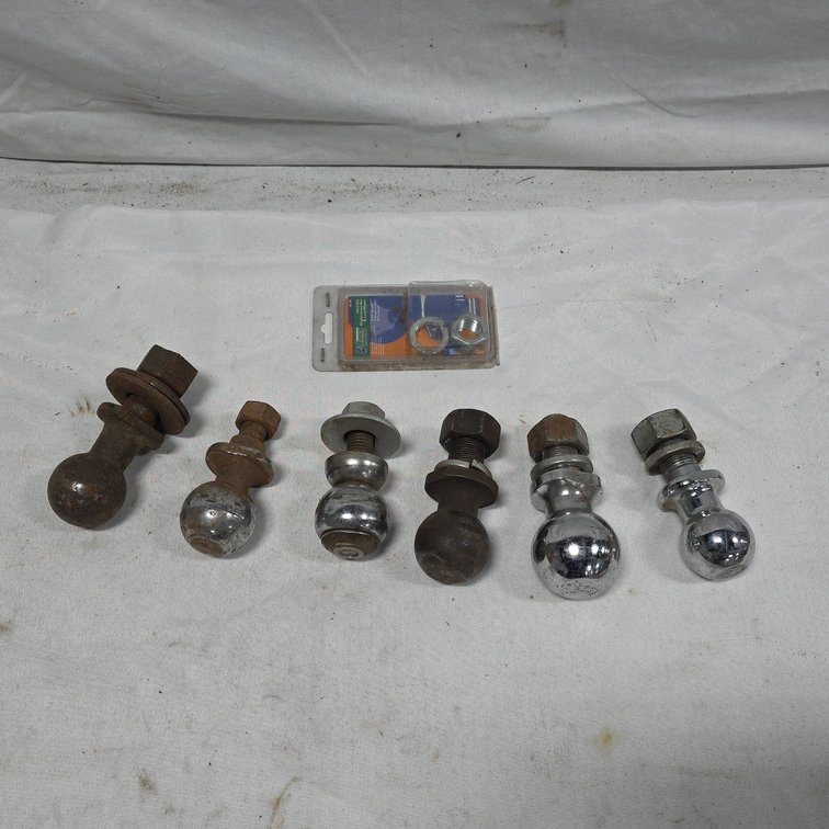 Six Trailer Hitch Balls in Various Sizes, Plus Curt Hitch Ball Replacement Nut and Lock Washer