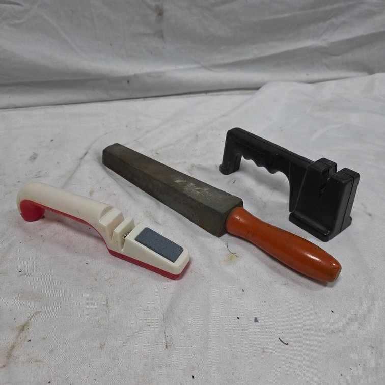 Knife Sharpener Lot Featuring Farberware Sharpener, and Sharpening Stone