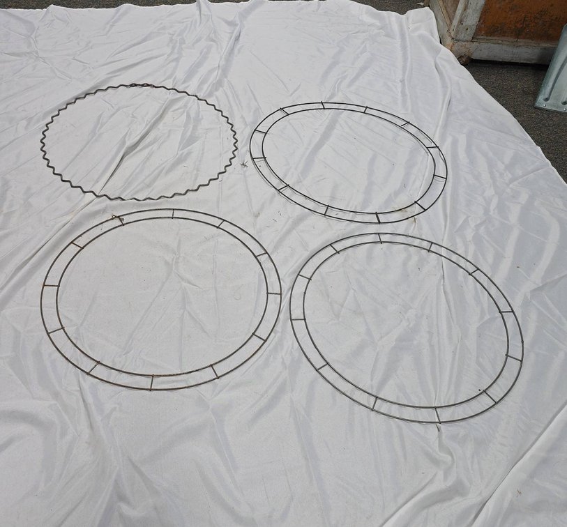Four 24" Metal Wreath Forms Including Three Circular and One Zigzag Edge Wire Frames