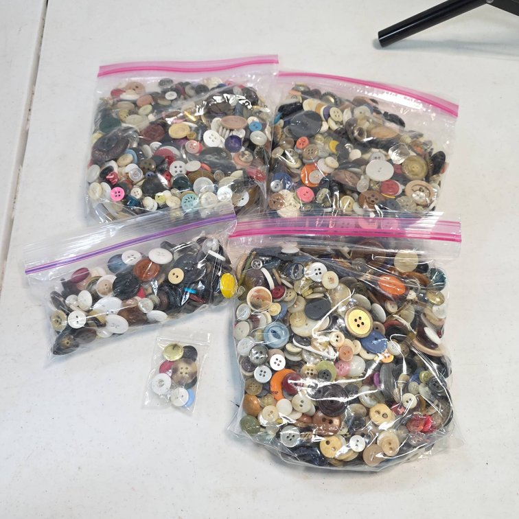 Material Buttons in Various Colors and Sizes