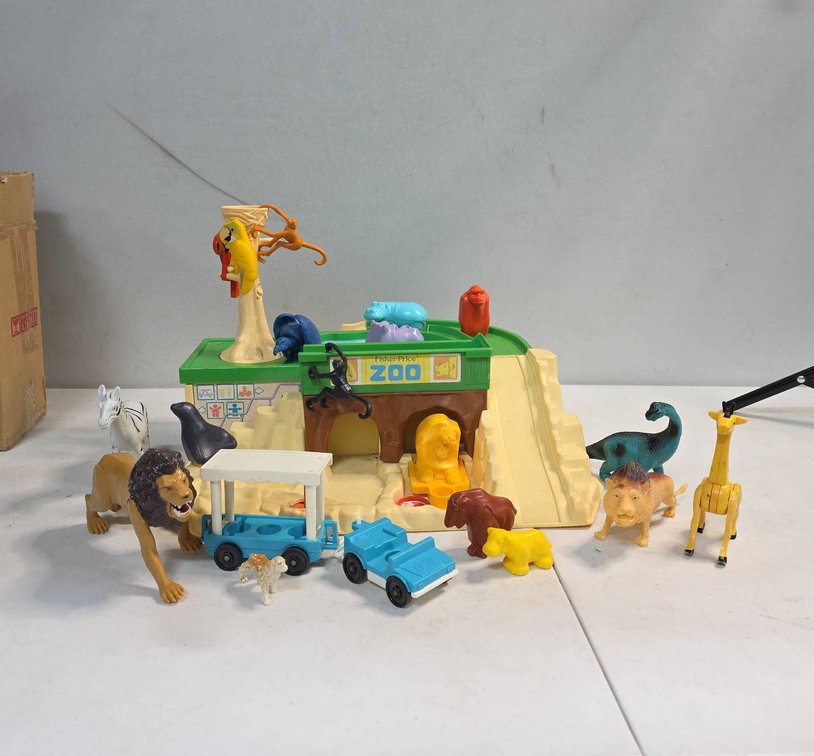 Fisher-Price Zoo Playset with Assorted Animals, Vehicles, and Accessories