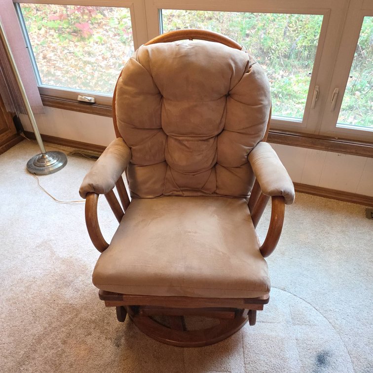 Wood Frame Swivel Glider Armchair with Tufted Tan Cushions and Rounded Backrest