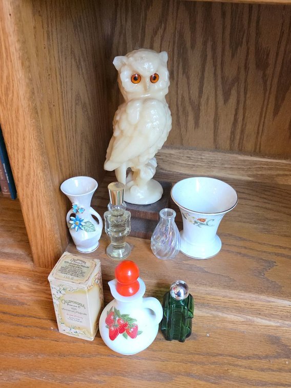Decorative Items Featuring 10" Tall Owl Candle, Avon Bottles, Miniature Vases, and Cologne