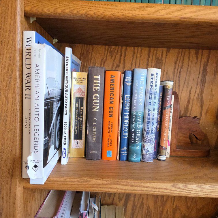 13 Books Including World War II, American Auto Legends, Lost Horizon, and The Wager