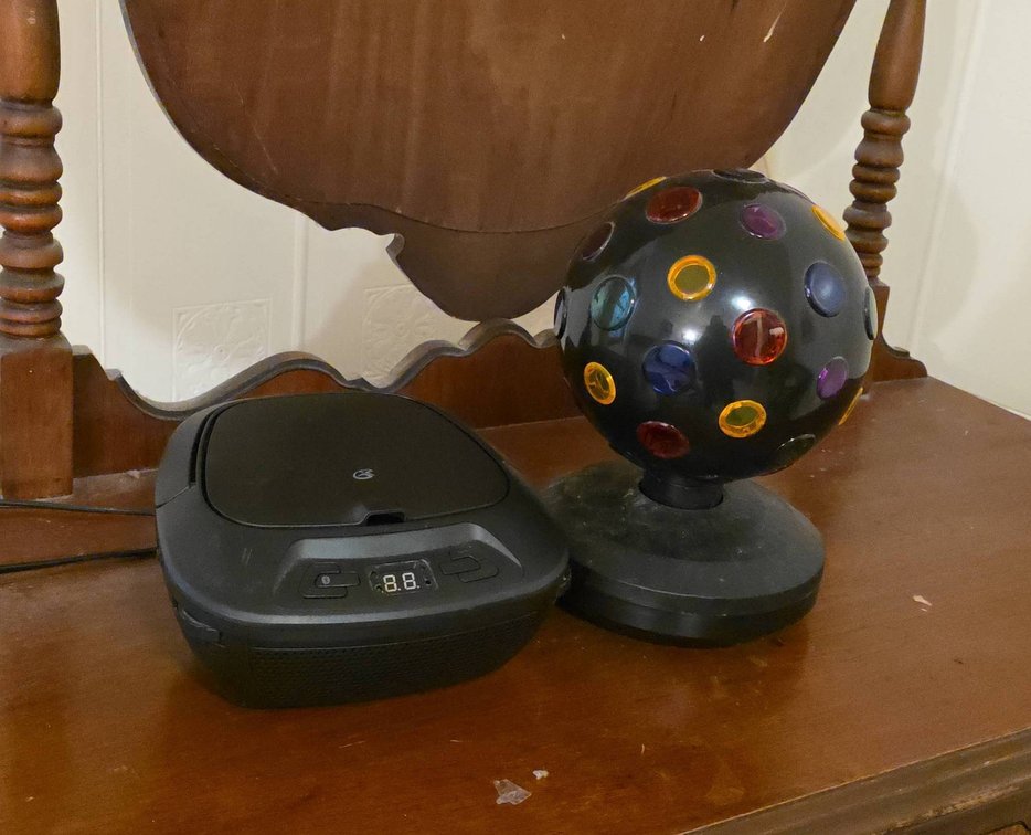 Bluetooth CD Music System and KD 08/2012 360 Disco Light, Both Power On