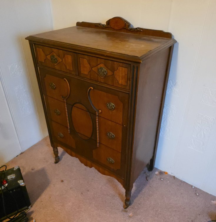 Wooden Chest with Four Drawers and Ornate Details