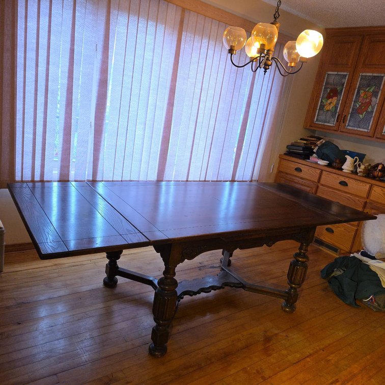 Oak Veneer Expandable Dining Table with Carved Accents, Extends from 5' to 8' Long, Leaves Included