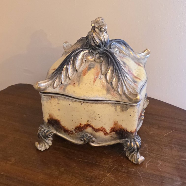 Decorative Resin Lidded Box with Ornate Scrollwork, Footed Base, and Fleur-de-Lis Finial