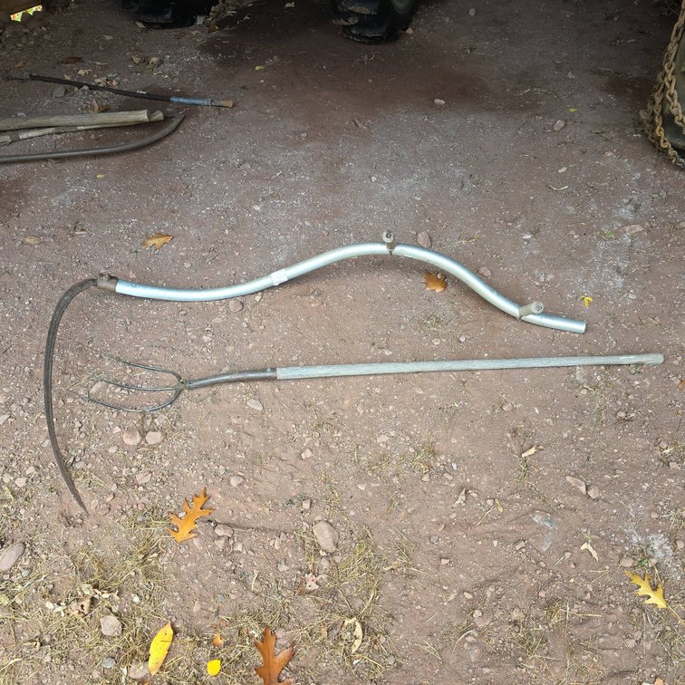 Vintage Scythe and Three-Prong Pitchfork with Metal Handles and Curved Scythe Blade