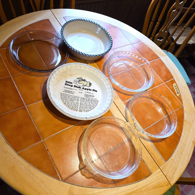 (6) Pie Plates Including Pyrex Glass, Ceramic, and Watkins Deep Dish Apple Pie Plate