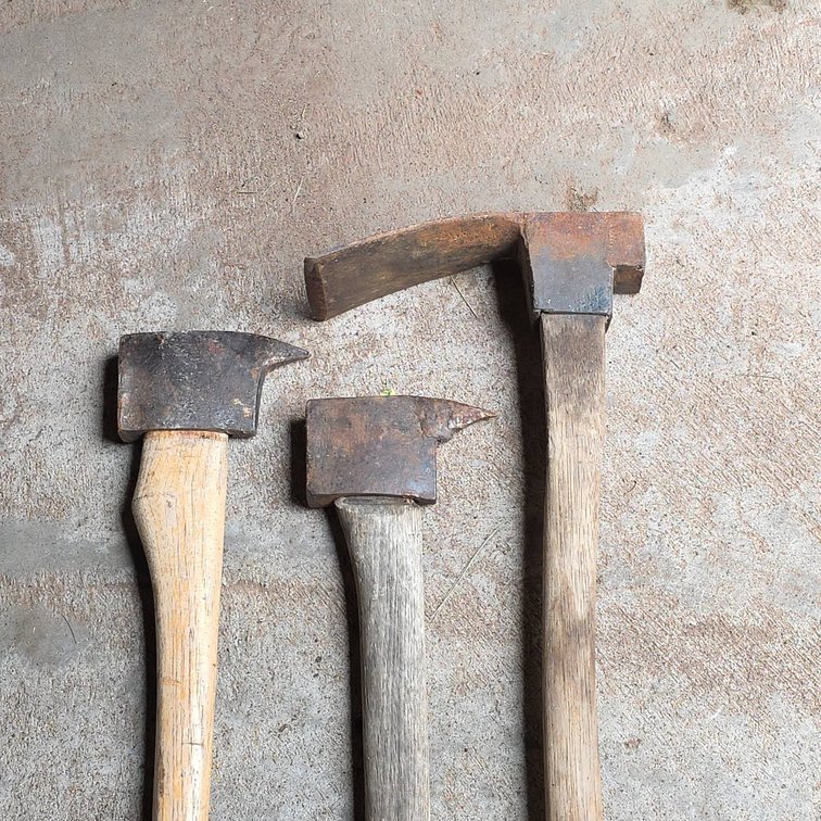 3 Hand Forged Logging Tools Including Broad Axe, Pickaroon, and Cant Hook Head