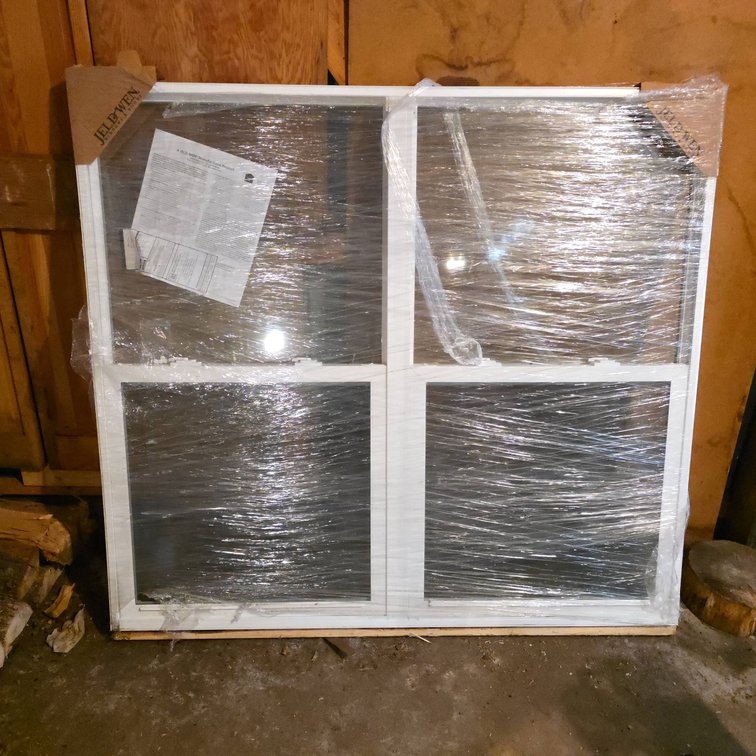 JELD-WEN Double Hung Vinyl Window 61 1/4 x 55 1/4 with Screens and Labels