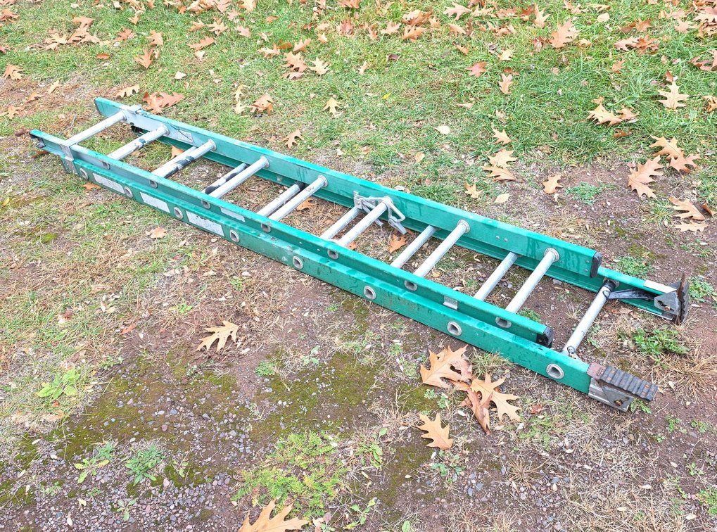 Green Fiberglass and Aluminum Extension Ladder, Approximately 14 ft Length, Dual-Section Outdoor Utility
