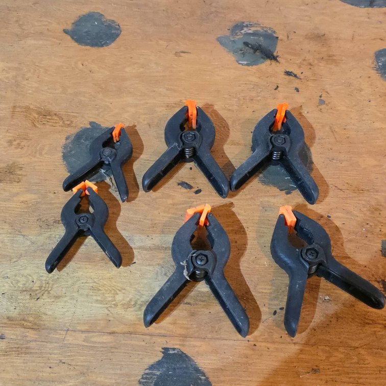 6 Plastic Spring Clamps with Orange Pivoting Jaw Pads, Black Construction