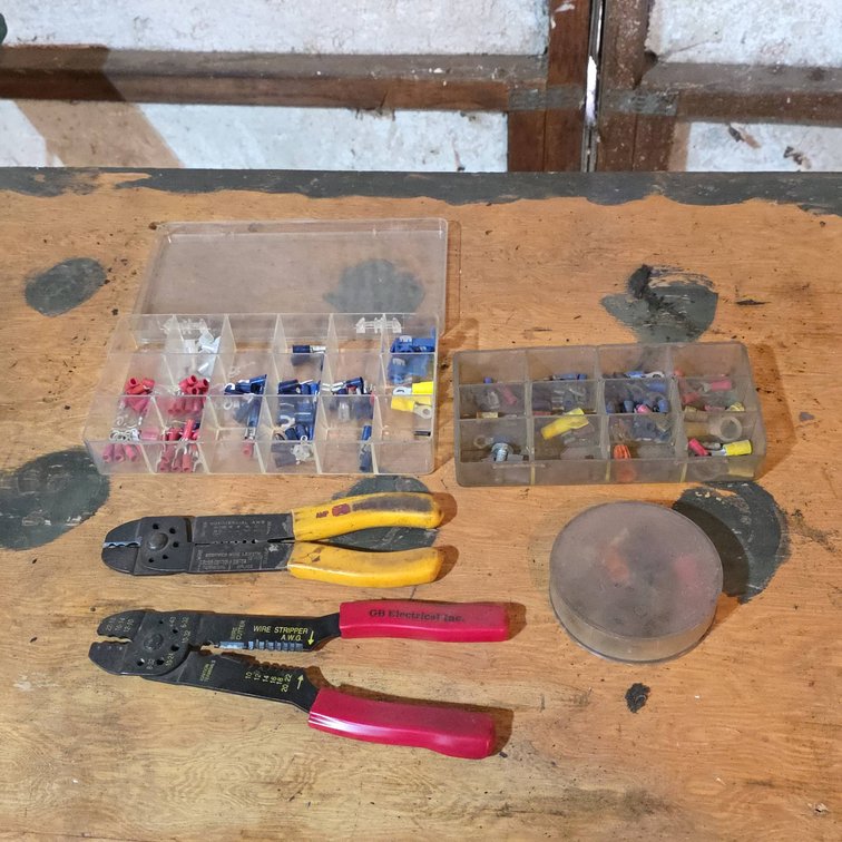 Wire Stripper Tools With Assorted Electrical Connectors and Terminals