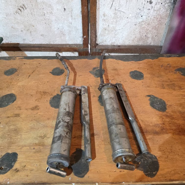 (2) Manual Lever-Action Grease Guns with Flexible Hoses, Metal Construction