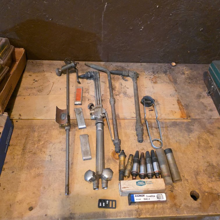 Smith Cutting Torch With Assorted Tips, Union Carbide Parts, Radnor Cleaner, And Accessories