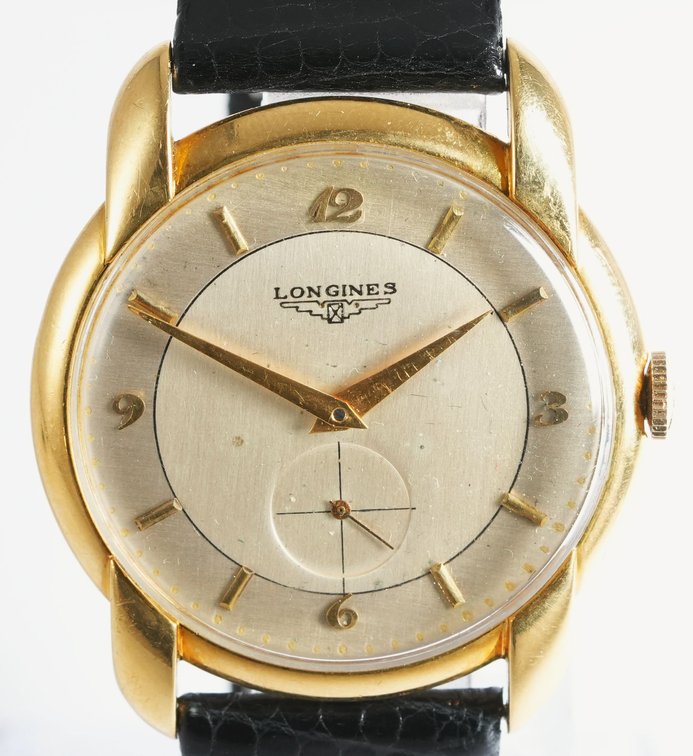 Longines in 18K gold, manual wind