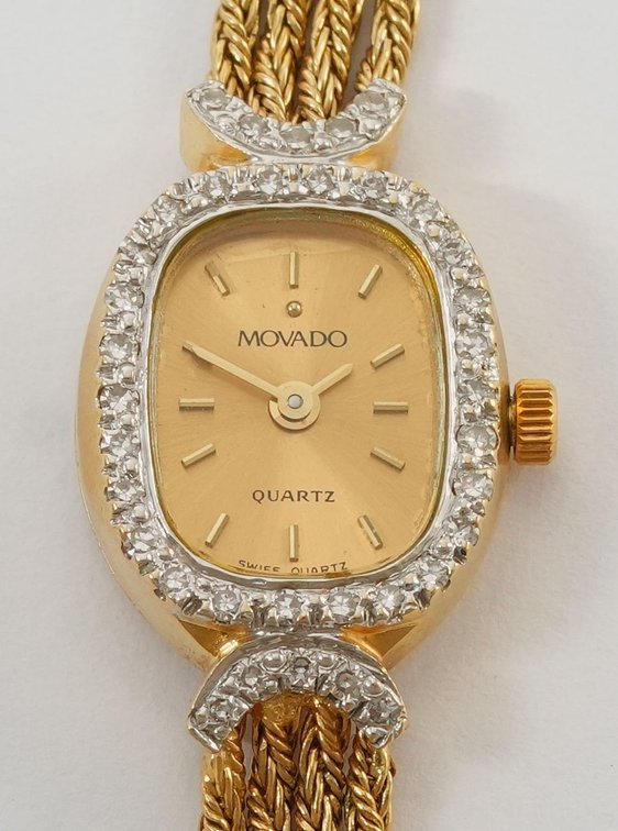 Lady's Movado cocktail watch in 14K