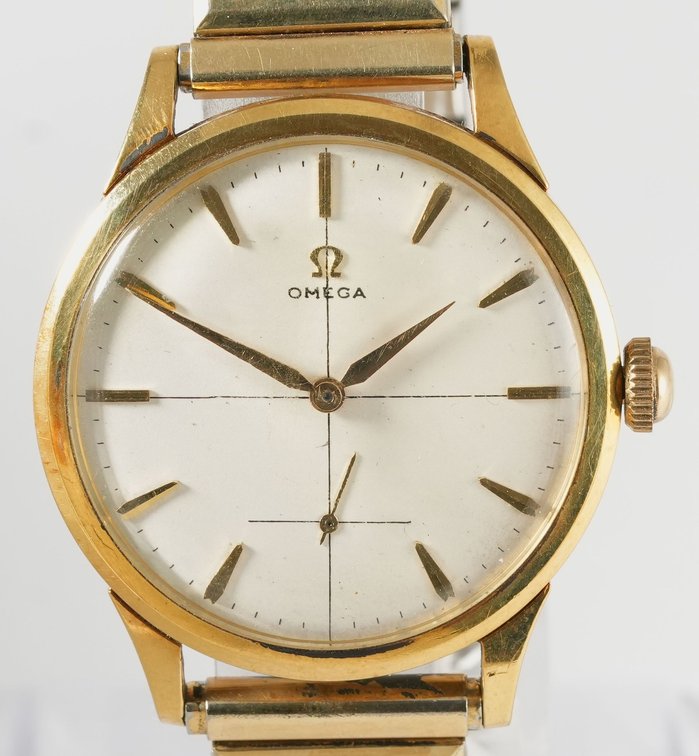 Omega, manual wind in 18K