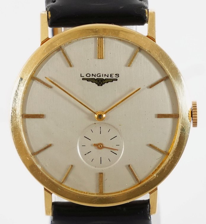 Longines, manual wind in 14K yellow gold
