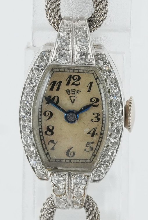Lady's Movado diamond cocktail watch in platinum and 14K