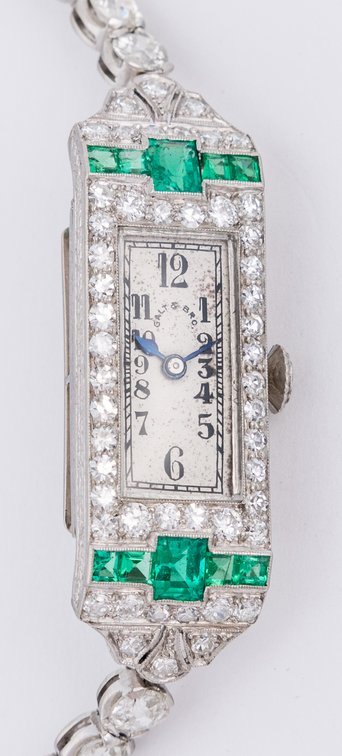 Lady's Patek Philippe retailed by Galt Brothers, over 6 carats of diamonds & emeralds