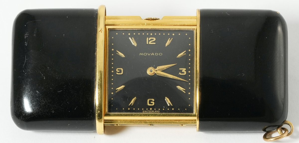 Movado, Ermeto purse watch in metal doré w/black enamel