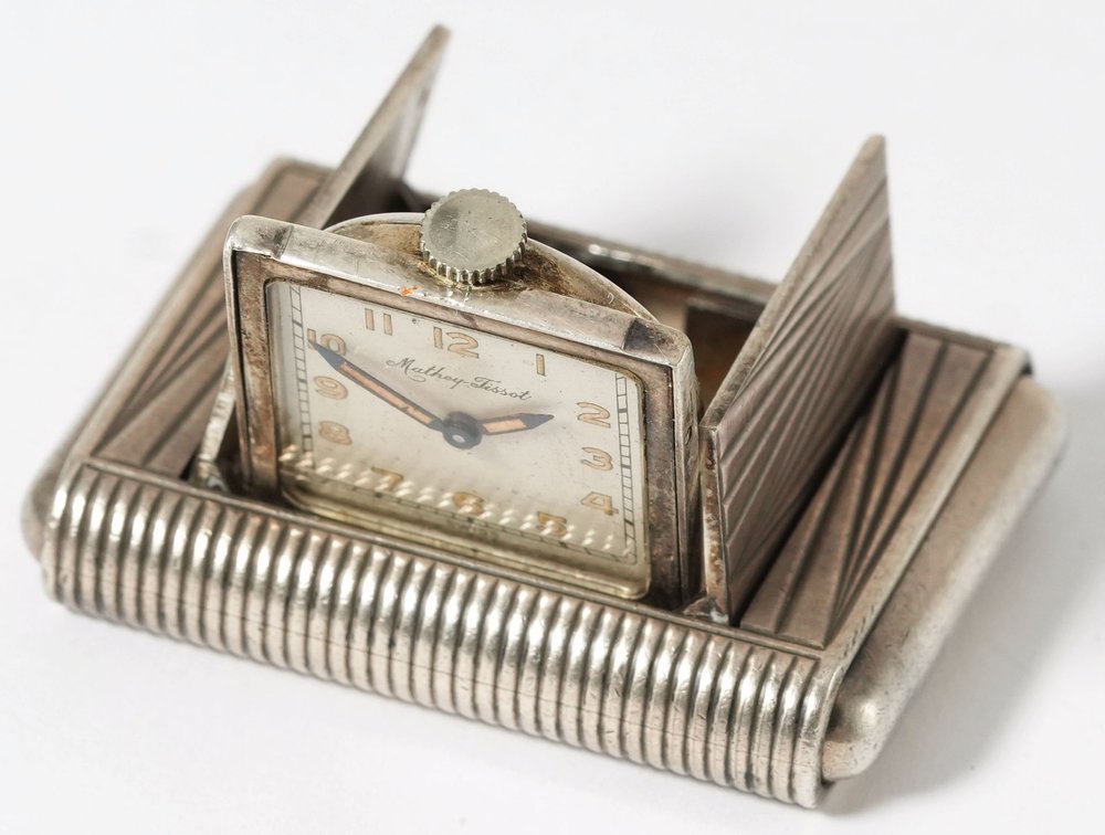 Mathey-Tissot, La Captive purse or travel watch