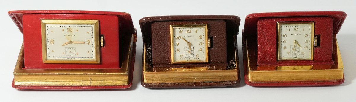 PW lot (3) Book form travel watches, all run