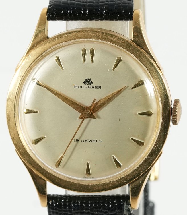 Bucherer, manual wind in 18K