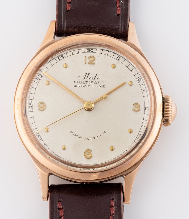 Mido, bumper automatic in 14K