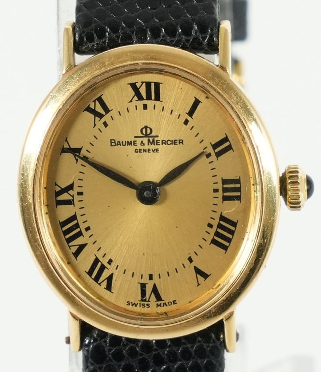 Lady's Baume & Mercier manual wind in 18K