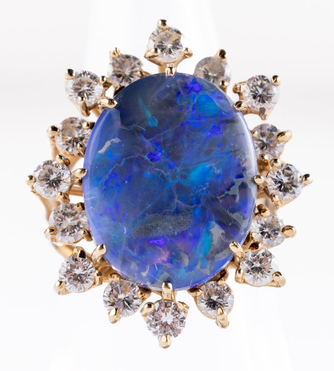 Black opal & diamond halo ring in 14K yellow gold