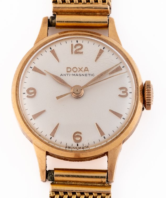 Lady's Doxa, manual wind in 14K w/18K bracelet