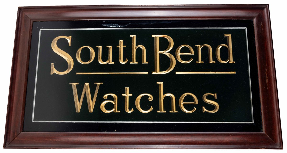 South Bend Watch Co reverse painted glass sign