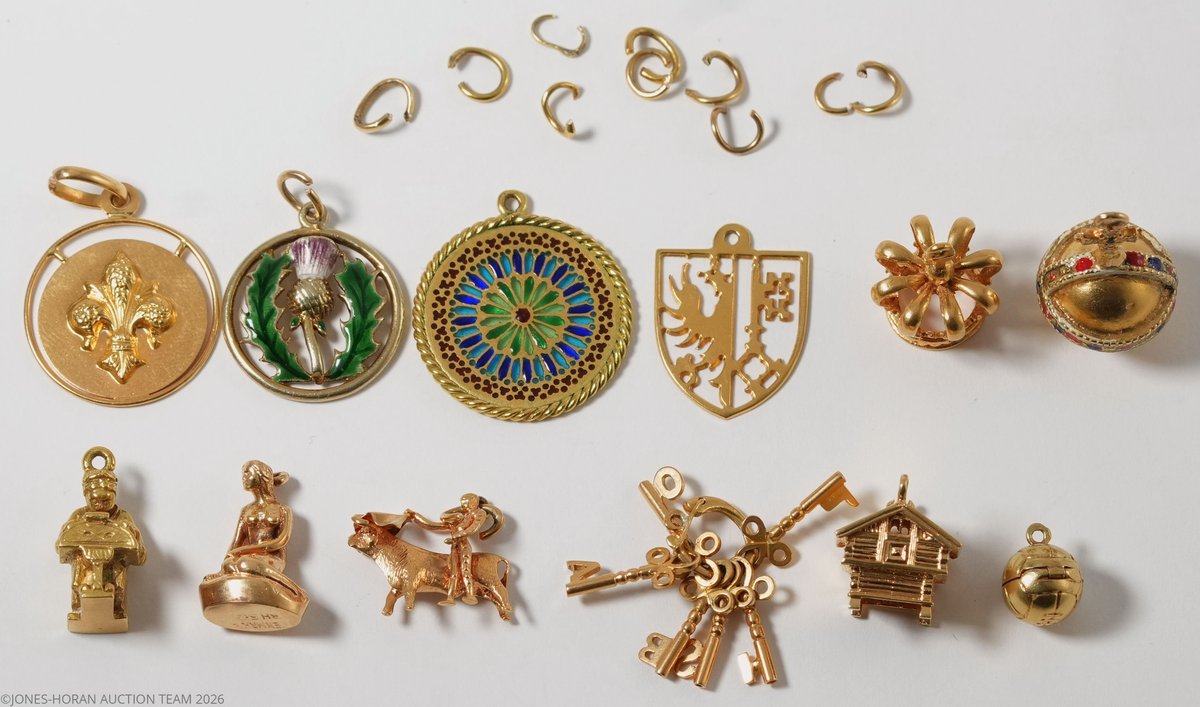 Jewelry lot (12) Assorted gold charms in various materials including 9K, 14K & 18K gold