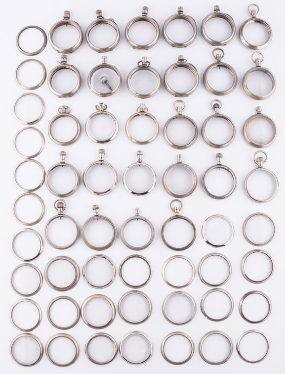 Lot (70) Nickel display case components, 16-18S