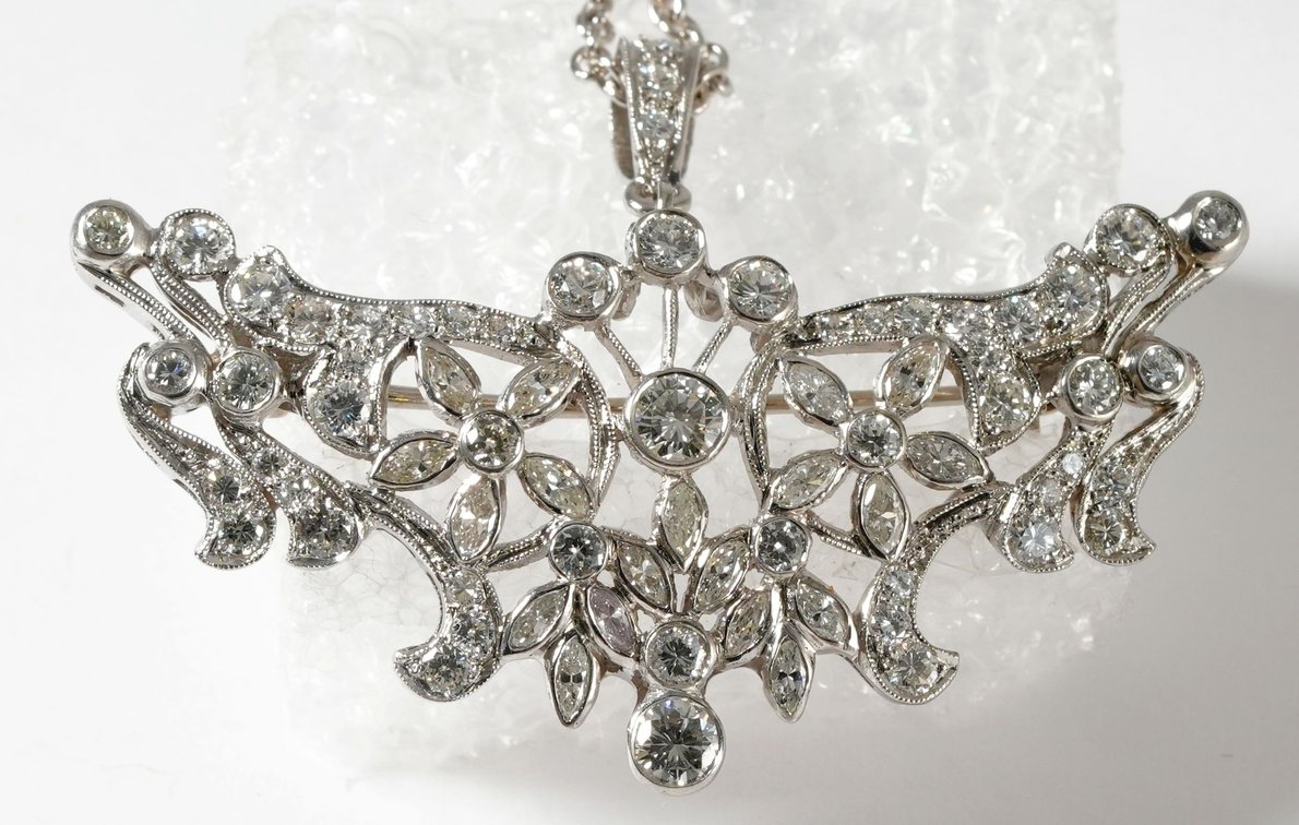Diamond, platinum pin/pendant on a 14K white gold chain