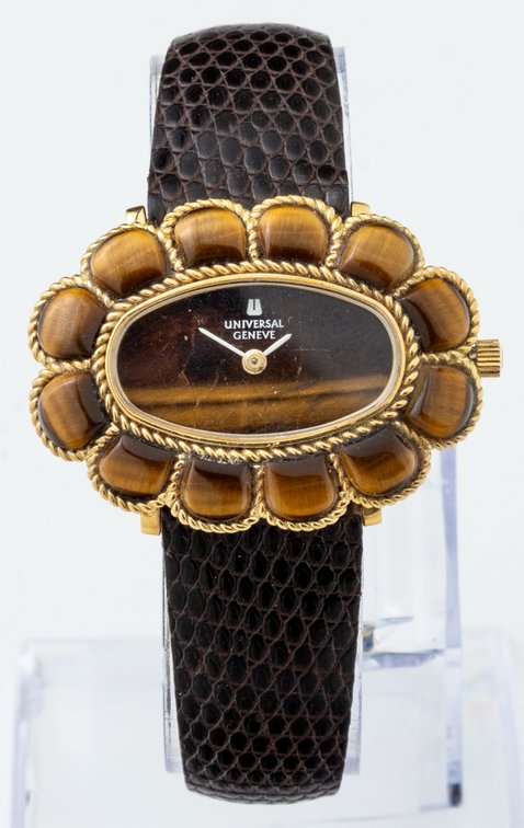 Lady's Universal Genève, ref 04429, manual wind in 18K with tiger's eye dial