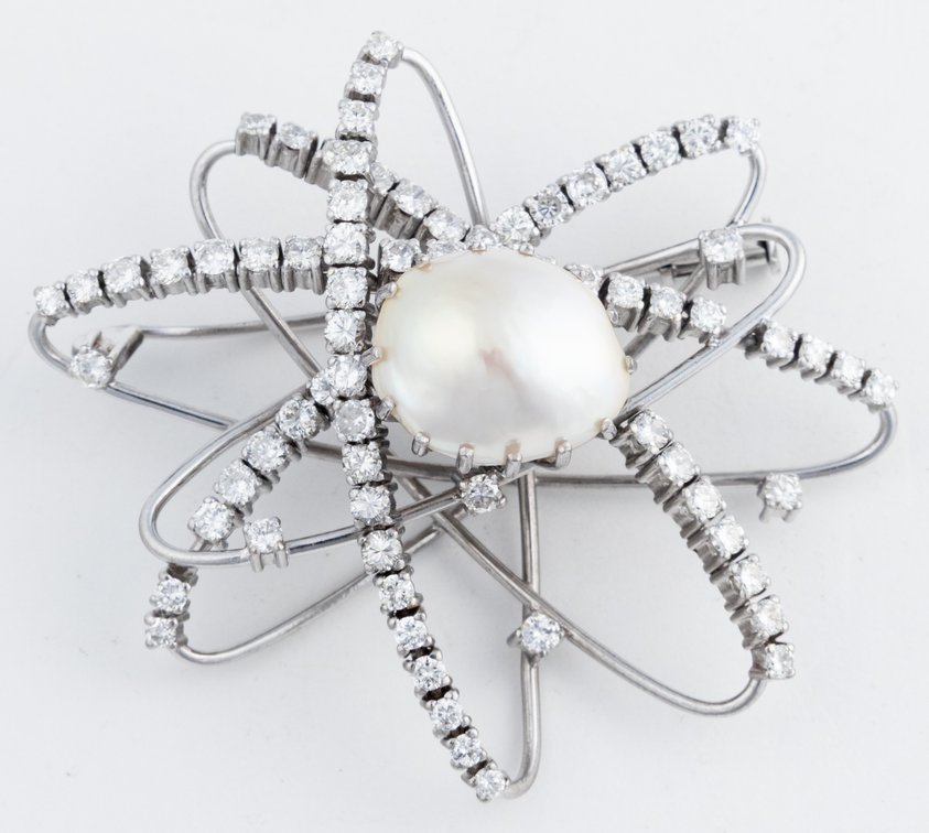 Pearl, diamond & 18K white gold pin in the style of a carbon atom