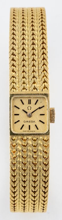 Lady's Omega, manual wind in 18K w/B&P